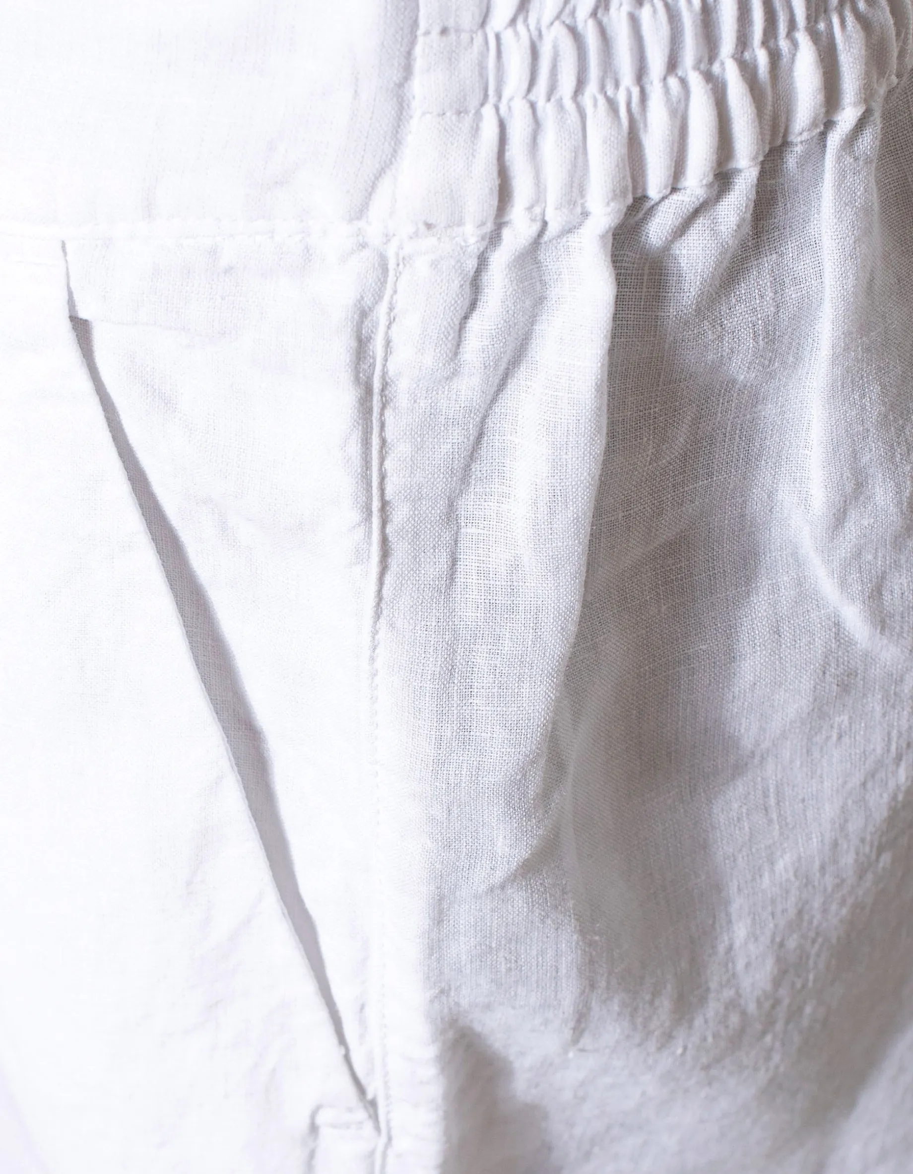Cropped Leinen-Bundfaltenhose